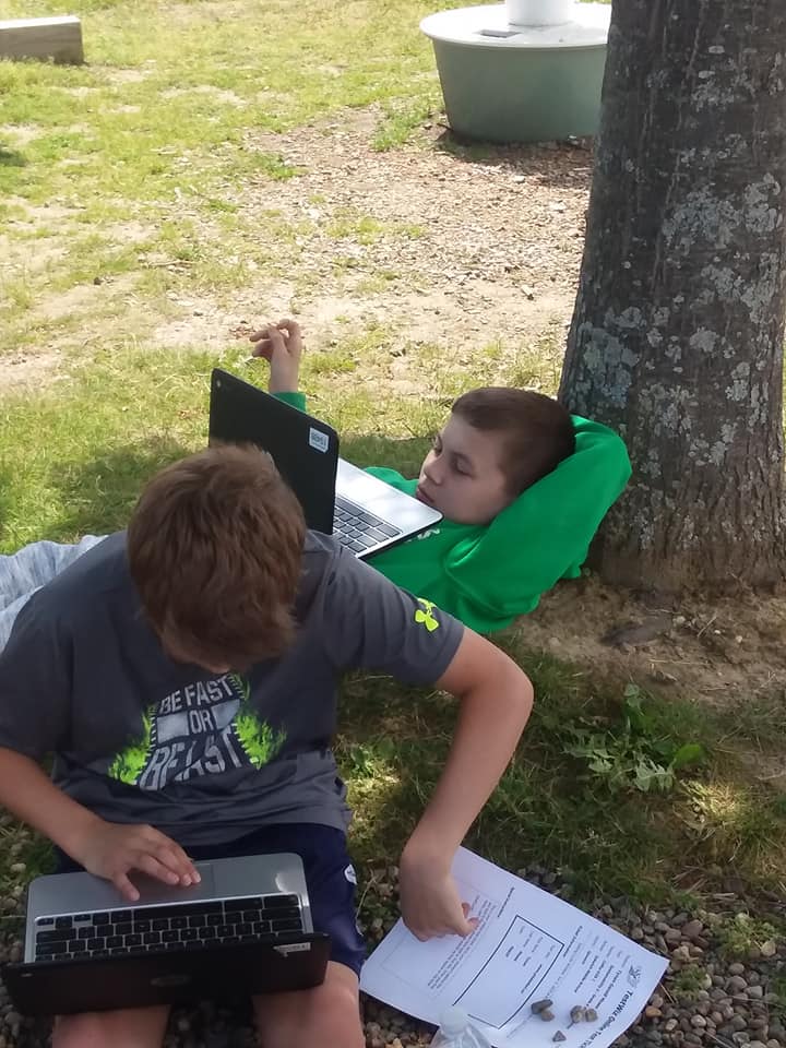 ColbyIMS's tweet image. Science class in the garden today.  It was too nice to be inside when we have such a wonderful space to use.