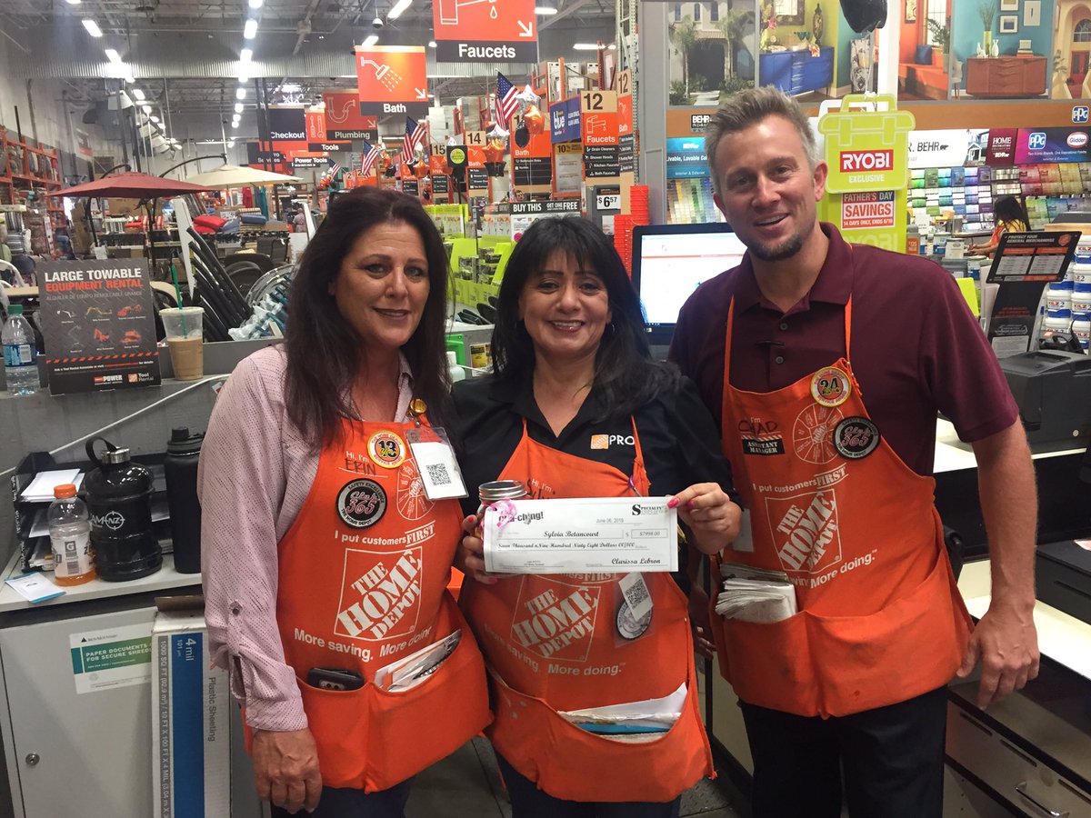 Sylvia from the Service Desk being recognized for driving services with a water treatment sale!