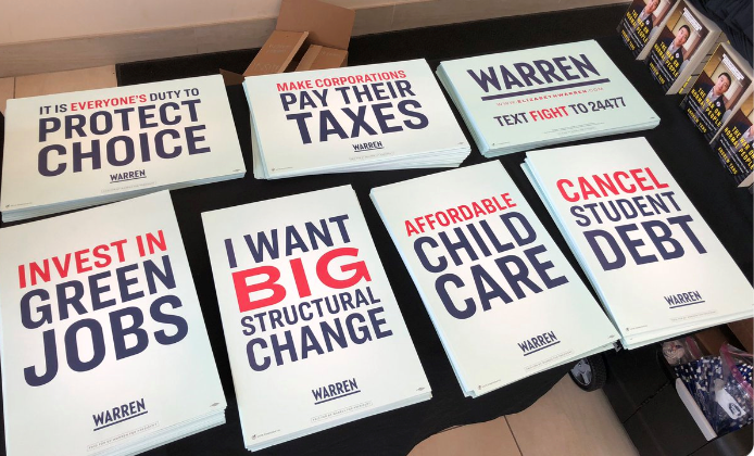 LolaMotz's tweet photo. I'm glad Warren had those signs printed, because now it's clearer than ever that certain priorities of the progressive movement are not addressed. 
#EndingEndlessWars
#ClimateEmergency
#MedicareForAll 
#LivingWage 
#PublicEducationReform 
#LegalizingPot
#CriminalJusticeReform https://t.co/yN5UfsaSwd