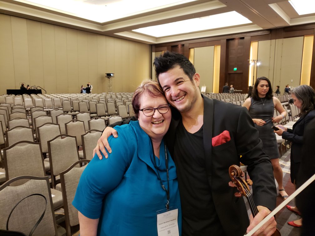 AnchSymphony's tweet image. Last week, at the @OrchLeague conference, our Executive Director, Sherri Burkhart Reddick ran into a familiar face - @NicolasKendall of Time for Three! Keep an eye out 👀, this trio has a new recording being released on 6/14. 🎻🎧  #NorthofOrdinary #SeeingOldFriends #TimeforThree