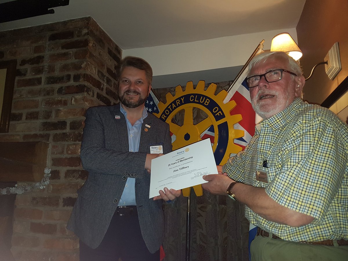 Our future District Governor presenting a certificate for 25 years of service, to Rotarian Jim Tifney. Congratulations Jim you're a real star.