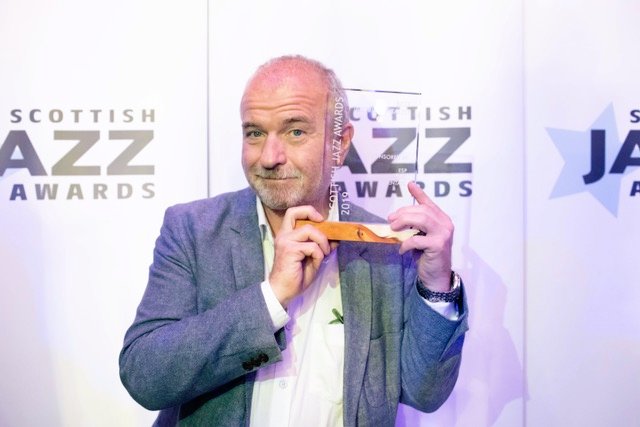 girlfridayjazz's tweet photo. Well, that's another fine award we have to find space for on our new book shelves ... the Best Instrumentalist trophy from the Scottish Jazz Awards 😊🎹. #ScottishJazzAwards #BrianKellock https://t.co/6LrVvr7Wgu