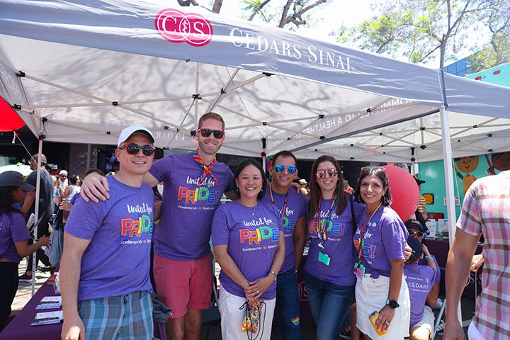 Employees at the Cedars-Sinai tent.