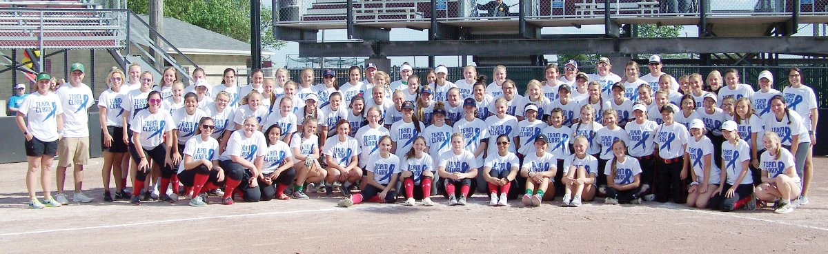 The Fort Dodge, St. Edmond, Marshalltown and Hampton-Dumont softball teams pose at Rogers Park in "Team Clark" shirts to honor <a href="/humboldtHS/">Humboldt High School</a>'s Ashlyn Clark, who is battling cancer. Over 900 shirts were ordered as of Monday afternoon. <a href="/AshlynClark9/">Ashlyn Clark</a> <a href="/FDSHSoftball/">FD Dodger Softball</a> <a href="/SEGaels/">St. Edmond Catholic</a> <a href="/IGHSAU/">IGHSAU</a>