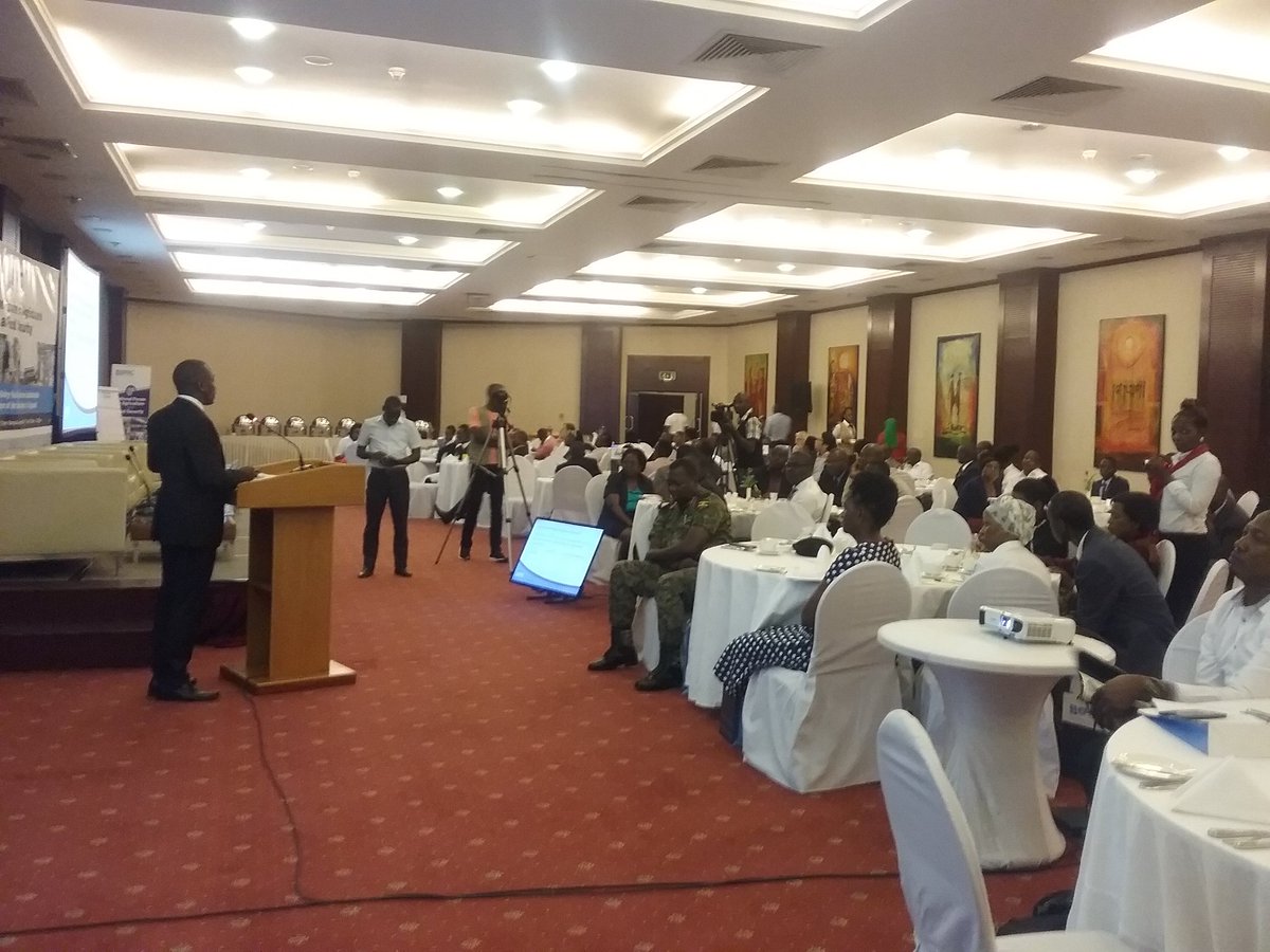 Muhangi's tweet photo. Dr.Francis Mwesigye of EPRC presents to an attentive audience at the ongoing National Forum on Agriculture and Food Security. "Why milk yields have declined among dairy households in Uganda"#MonitorUpdates https://t.co/MmByx22jkR