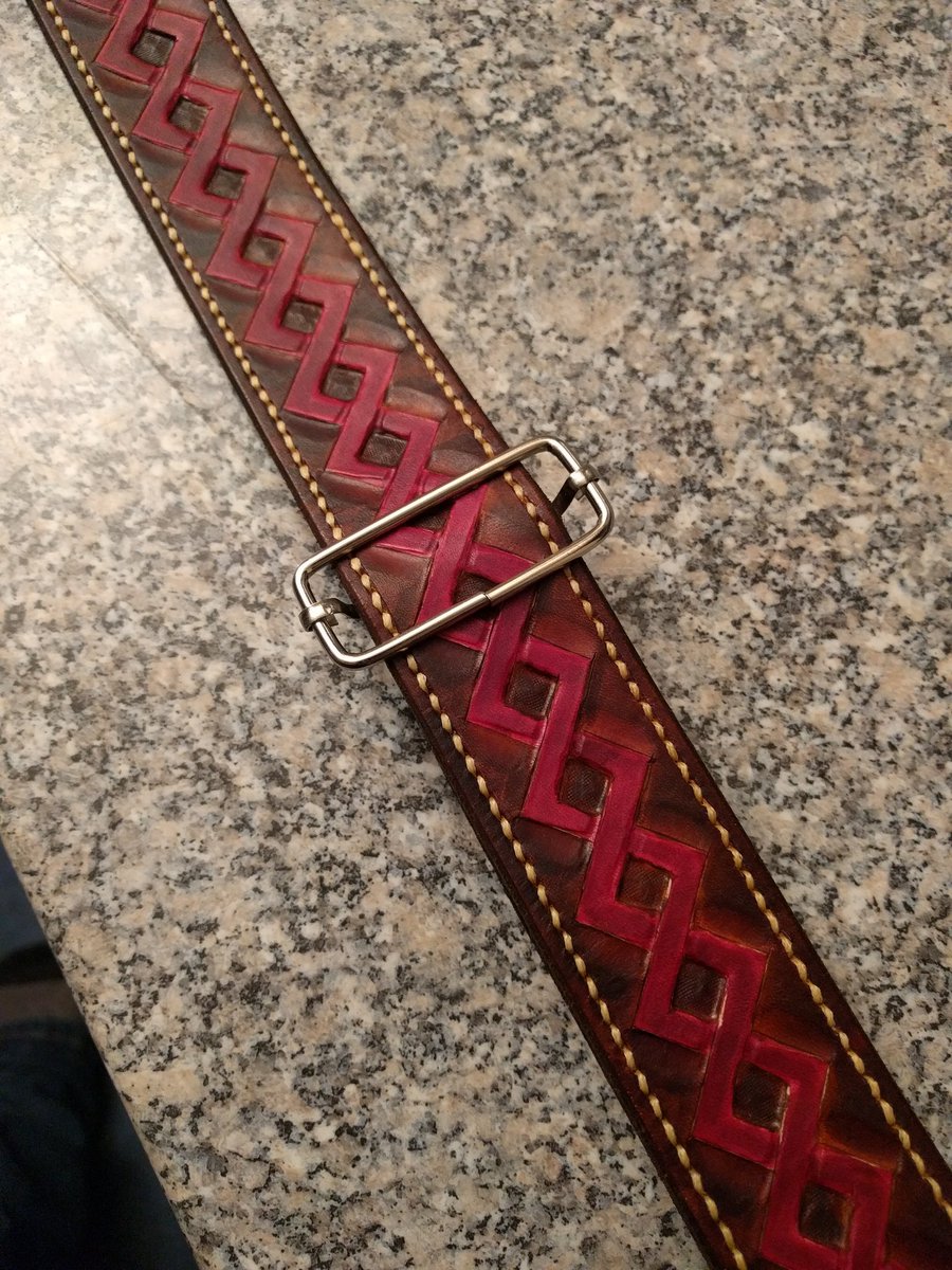 TheSmokinSmithy's tweet photo. Shield strap for Luke. 130cm/51" of 5mm veg tan #leather. Hand tooled and dyed #knotwork along the entire length, screw stud rivets and a steel slider. The whole thing has been hand saddle stitched with decorative straw coloured thread.
#empirelarp #wintermark https://t.co/HIIXuF41fG