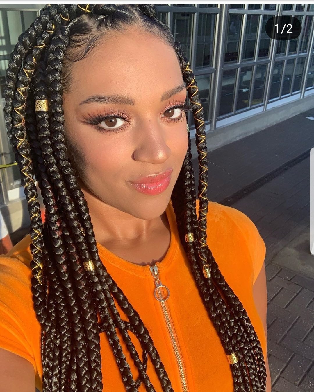 Image of Accessorized knotless braids hairstyle