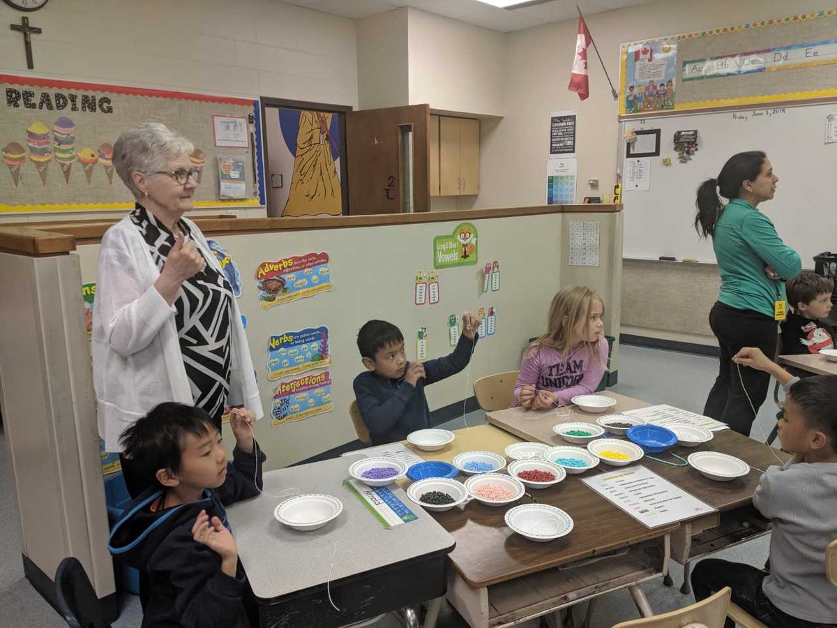 StJPIICCSD's tweet photo. Our grade 2 classes would like to say thank you to the amazing women from Holy Spirit parish who made rosaries with us. @CCSD_edu @StJPIICCSD #rosary #catholic #jesuschrist https://t.co/bueeBdRP37