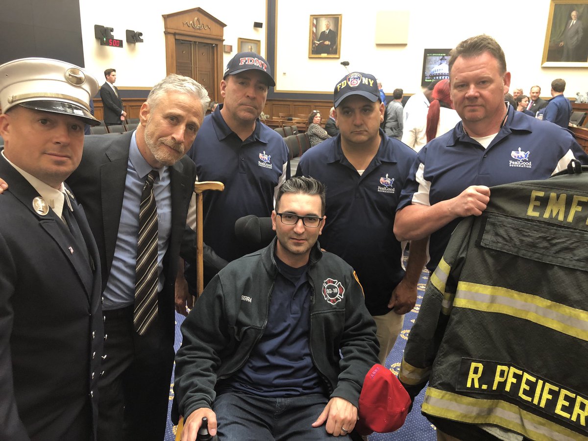SerraRob's tweet photo. @angryamericans FF Kenny Specht presented Jon Stewart Ray Pfeifer’s Bunker Coat for the tremendous support he has shown the 9/11 community over the years. He did another great job today. #unwavering #neverforget #renew911vcf #MyFriendsAreDying #episode002 #thechair https://t.co/VoMV2kwQVx