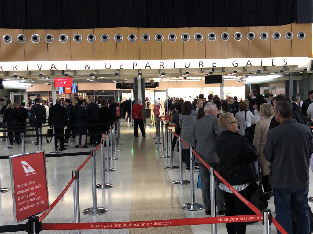 Economy vs business class queues at airport.  What colour you wear is very important 😅