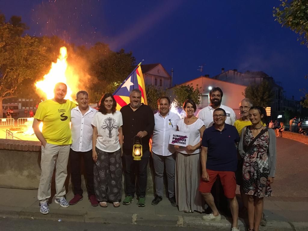 PUSA amb la flama del Canigò.