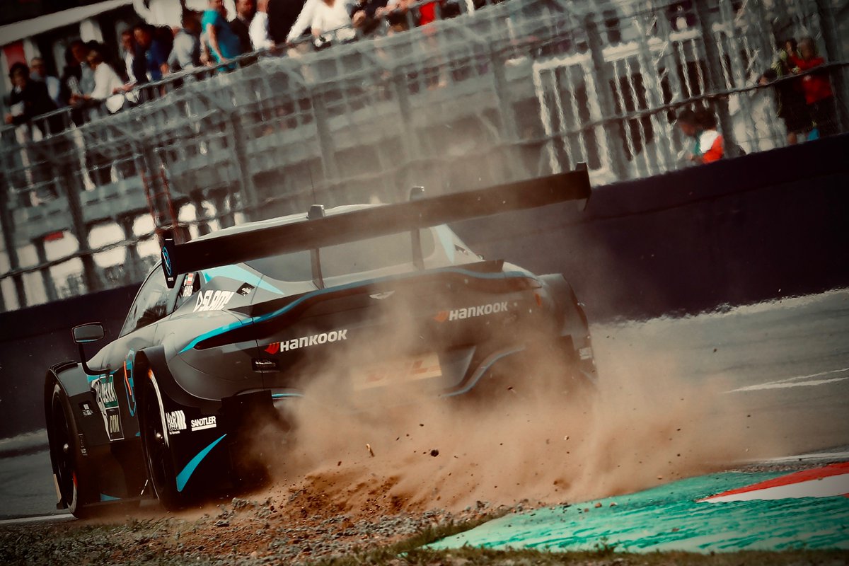 DTM's tweet photo. Bring back grass and gravel run-offs, you say? 🤔

Uh, in #DTM, they never went away... 😏
#BackToBasics https://t.co/7MtQF79ECz