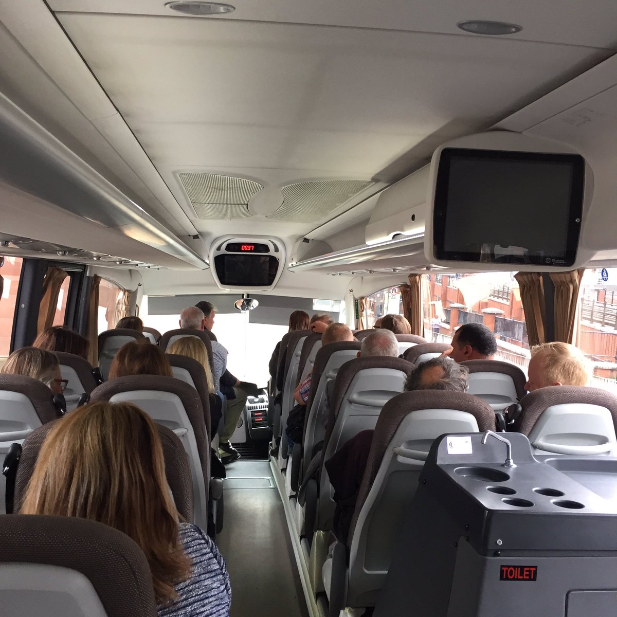 Seatbelts on for <a href="/OneMcr/">One Manchester</a> #regen tour of Hulme part of @CIH_Housing. I’m wearing so many hats today: <a href="/CIHLondon/">CIH London</a> @3dotproperty <a href="/SKTrustNW6/">South Kilburn Trust</a>