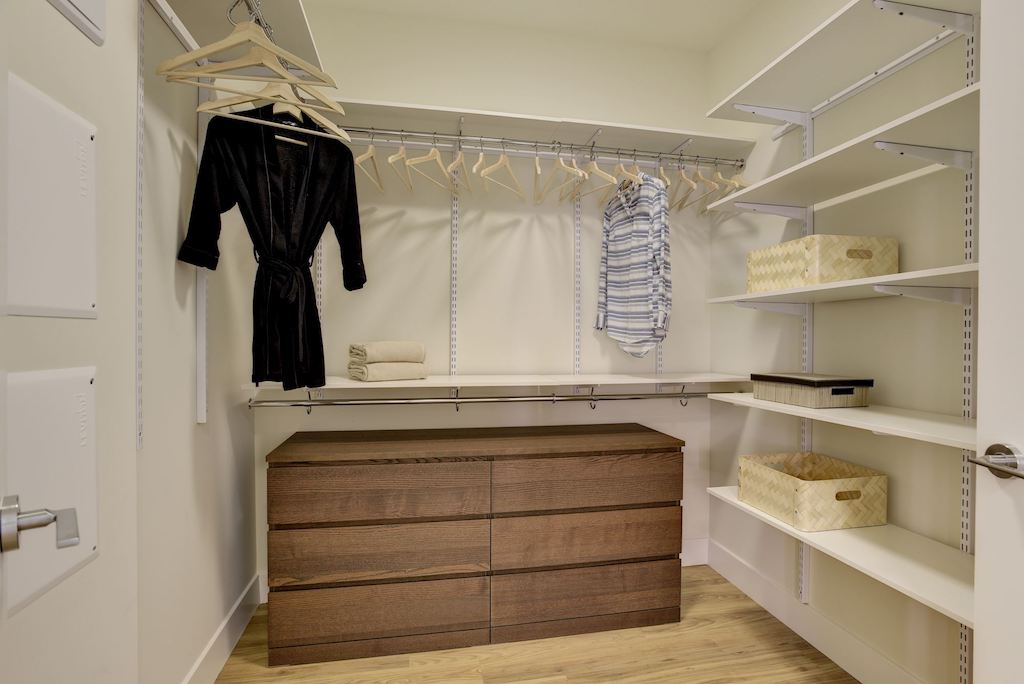Customize your walk-in closet to make room for extra storage or your latest shopping spree. #TheBerkleigh #Bozzutoliving