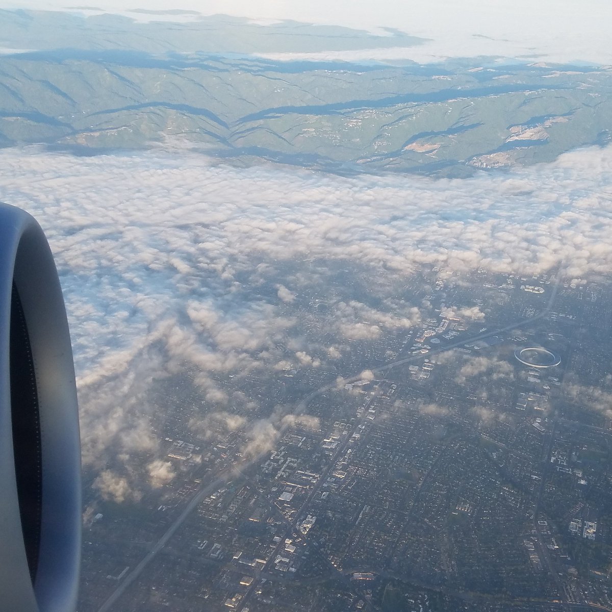 coffeemommy's tweet photo. Usually, when I fly across the country, I depend on the @delta inflight map to let me know where I am. But, occasionally, there are unmistakable visual clues. On my way to DC for @CancerAdvocacy #CPAT19, there is no mistaking that flyover building! #applespaceship https://t.co/0s95LMliO4
