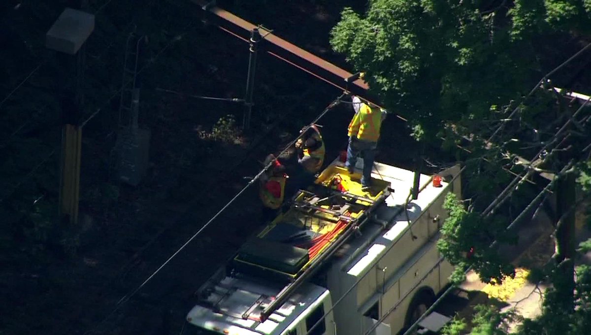 WCVB's tweet photo. After @MBTA #GreenLine wire issue on #DBranch, buses replaced train service. Sky5 is flying over crew working on the wires. https://t.co/wTqOdJE09O https://t.co/eWWP6xrc6U