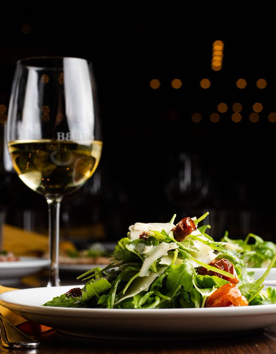 Make #MeatlessMonday even better with a show stopping salad! The Arugula &amp; Tomato salad is tossed with Lemon Vinaigrette and finished with Grana Padano. All you need is a glass of your favorite white wine!