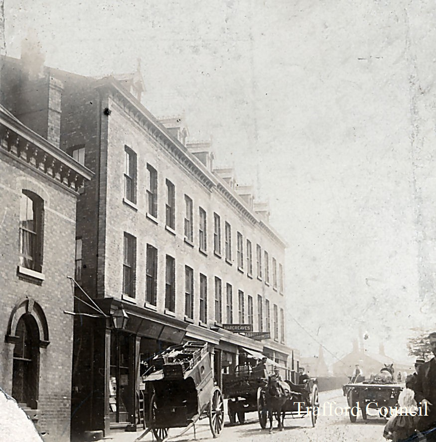 TraffordArchive's tweet image. Edge Lane looking towards #Stretford Station in the late nineteenth century.

Can you see the sign that reads 'Hargreaves'? The 1901 street directory lists Albert Hargreaves as a stationer living on Edge Lane. 

#History