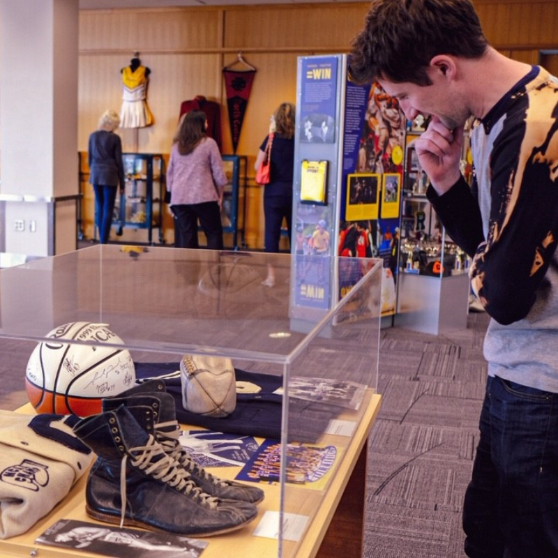 spokanelibrary's tweet image. The @smithsonian #HometownTeams exhibit is officially ready! Stop by the #Downtown Library to see all the cool #sports memorabilia we have on display -- from #Olympicmedals to local #lettermansweaters.
