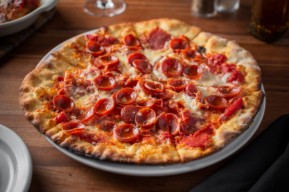 You can't go wrong with a classic #pepperoni pizza. Especially, when it comes with 1/2 priced bottles of wine every #Monday.