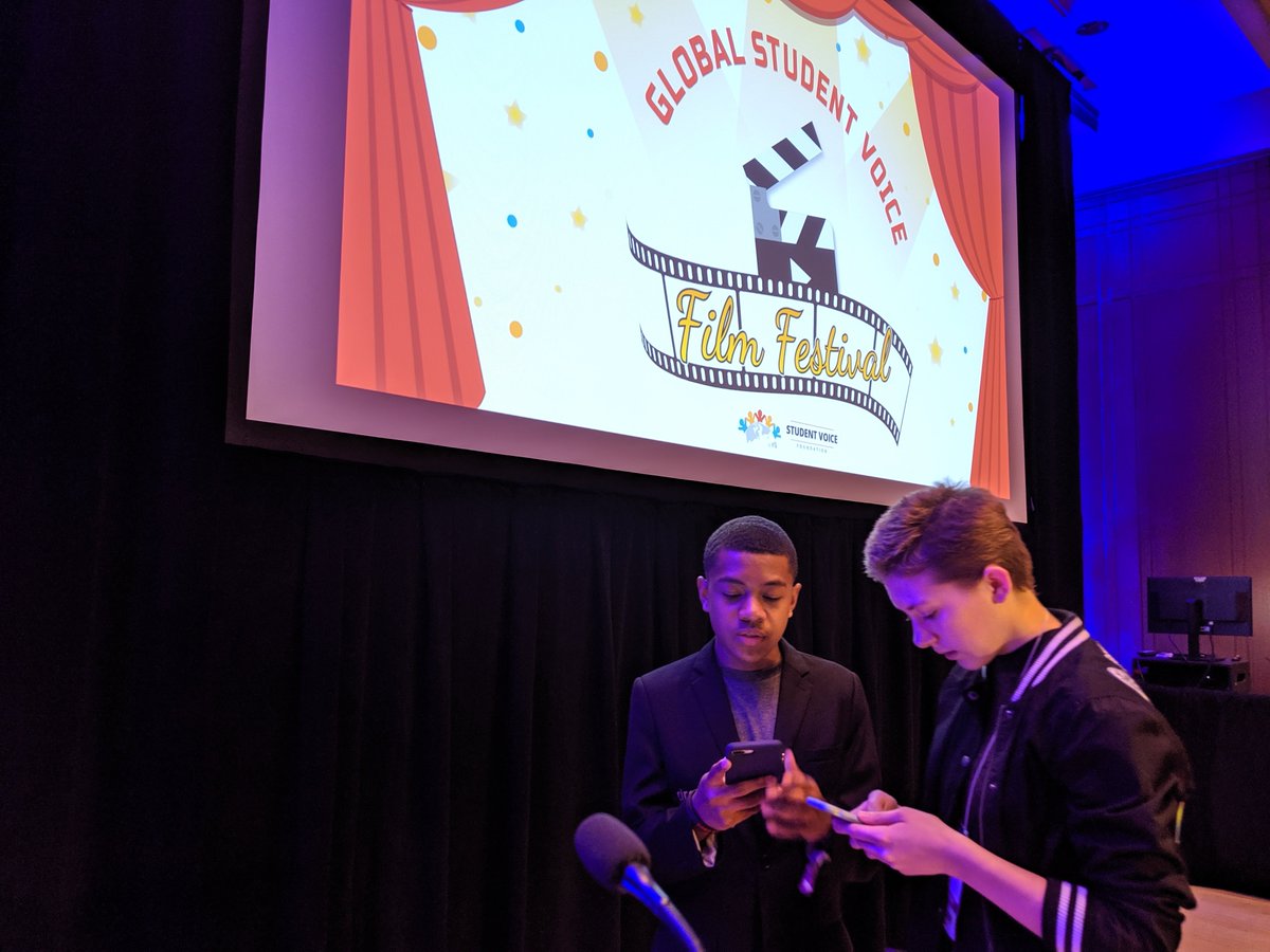 markwagner's tweet photo. @MsMagiera @dreamhustlecode @Roserezac @studentvoicefdn @iste @DigEquityPLN @edtechteam @drlangraad Ian and Rose prepare to cohost the Global Student Voice Film Festival at #iste19 in the Nutter Theater (Level 1 by 13th Street) right NOW (4 PM)! #edtechteam #wevideo https://t.co/CK94ueK1BL