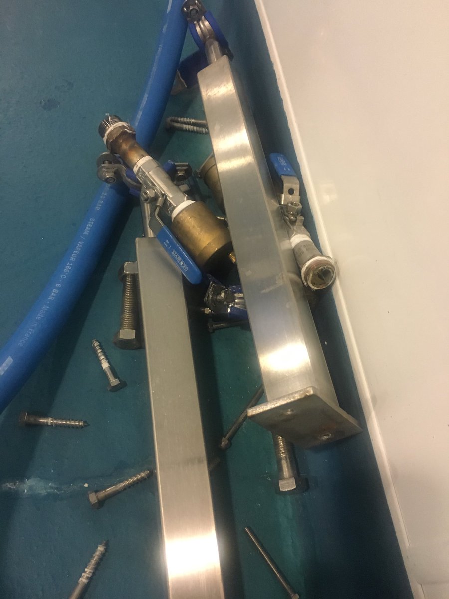 Prelude to a tough day tomorrow - dismantling the cheese production equipment before it gets shipped out .