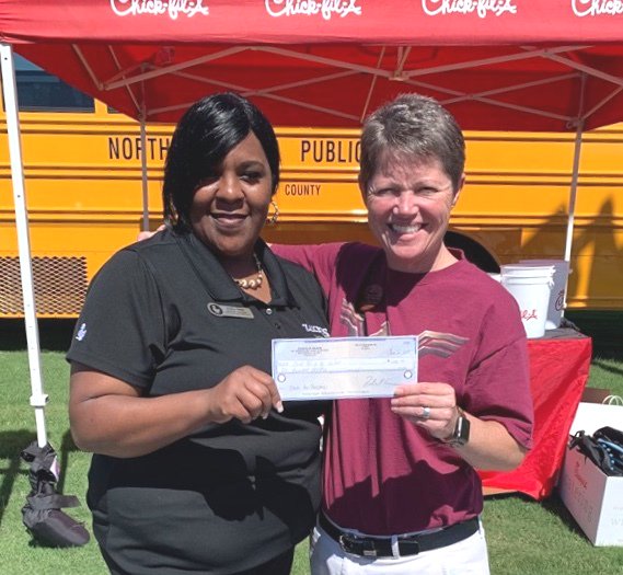 WilsonSchoolsNC's tweet photo. Chick-fil-A &amp; Zaxby's might compete a little bit when it comes to selling chicken, but they always come together to support our students in need of backpacks! Pictured is Zaxby's presenting $1,000 to Chick-fil-A to go toward Bucks for Backpacks! ❤️ #WCSistheBEST @ChickfilAWilson https://t.co/DiR4Mn5HBu