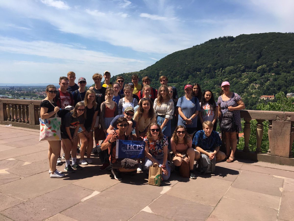 HenricoSchools's tweet photo. An exchange group of Mills Godwin students is in Germany visiting MGHS's partner school in Heidelberg. The #HCPSFlag says hi from the heights of Heidelberg Castle! https://t.co/z9mfhqUfXY