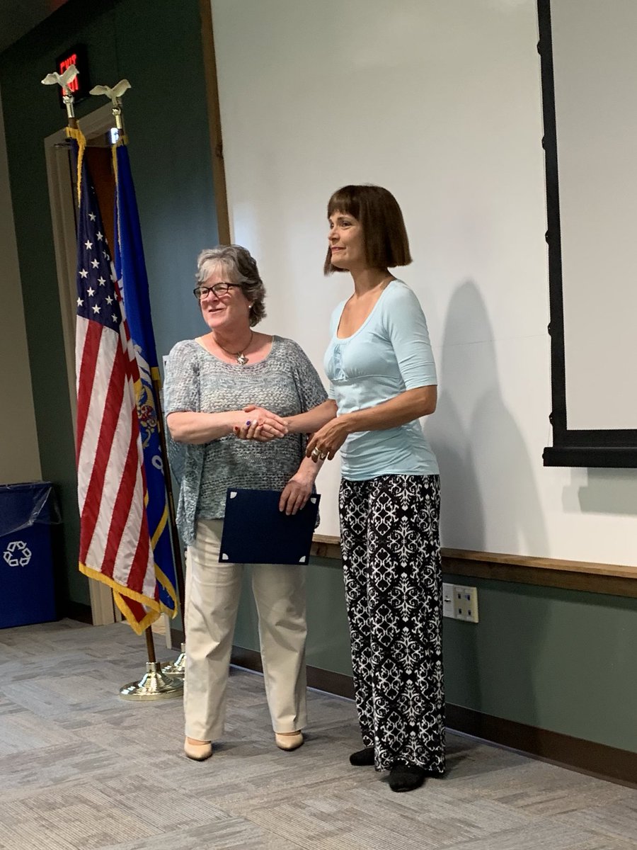 HSSD's tweet image. Tonight’s Board of Education meeting begins with recognition and appreciation for Jeanne Nolle, outgoing president of the Bay Port Booster Club. #TogetherIsBetter