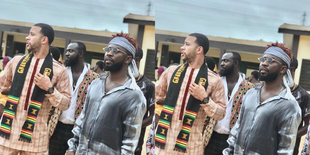 GhanaianMuseum's tweet photo. Memphis Depay, Former Manchester United player born to a Ghanaian father and a Dutch mother has arrived in Ghana to spend some time. He is currently in Cape Coast, to support the Deaf and Dumb School. And he chose to dress as one of them. https://t.co/FtpyuQHWwV