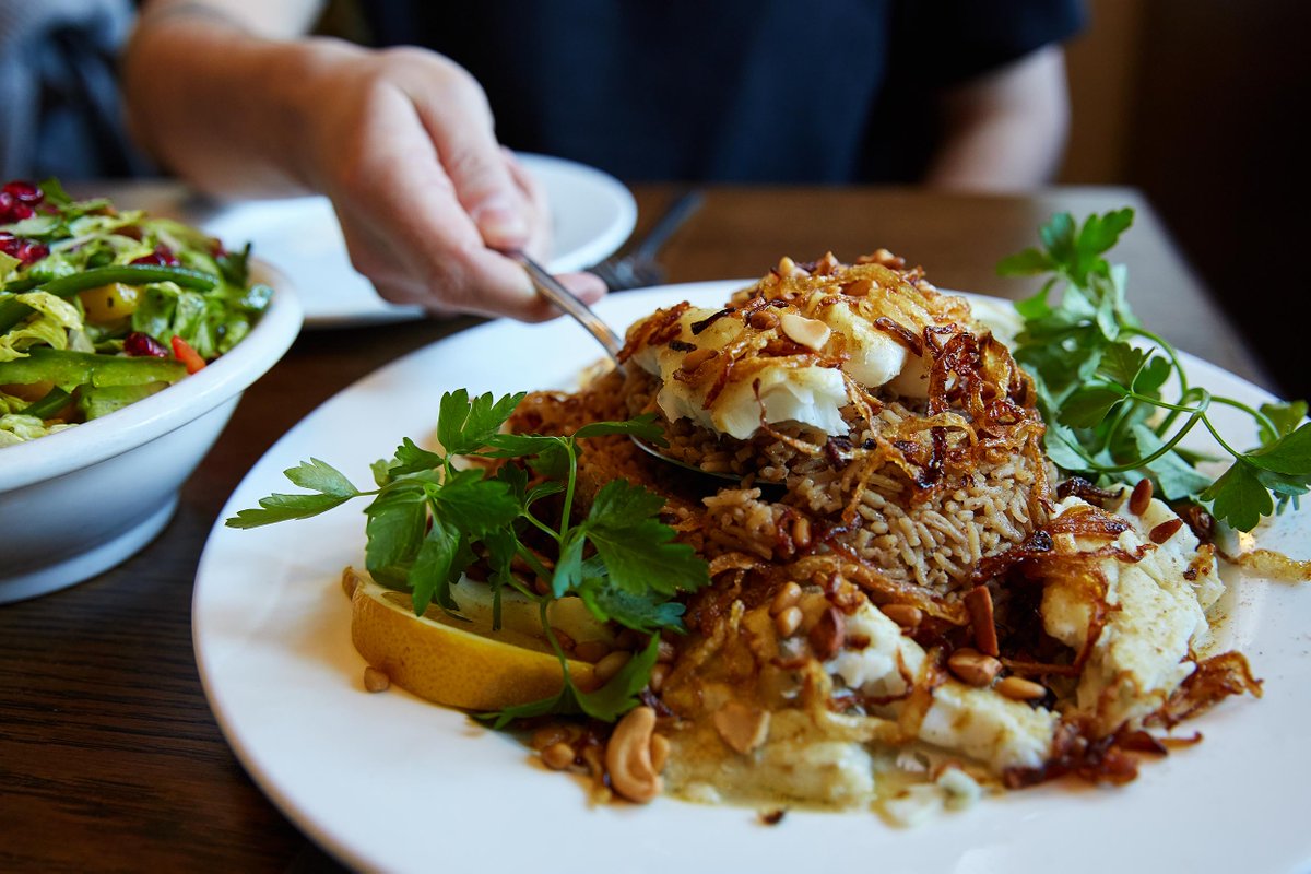 RandaRestaurant's tweet photo. Have you tried our delicious Sayadieh? Season baked cod 🐟  served with brown rice and tahine sauce. Have it with a glass of our exquisite Lebanese wine 🍷for a perfect meal! https://t.co/lmKguqiuUD