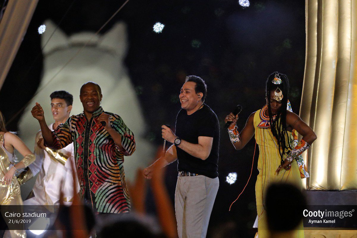 CootyImages's tweet photo. The performance for the official song for AFcon 2019 "Metgam3en" - at the opening ceremony 
Cairo international stadium 21/6/2019 
Photos: @CootyImages / Ayman kamel 
🇪🇬 : @hakim
🇳🇬 : @Femiakuti
🇨🇮 : Dobet_Gnahore 
#مصر2019
#شجع_مصر
#امم_افريقيا_2019
#كاس_الامم_الافريقية https://t.co/7YvjCimc6B