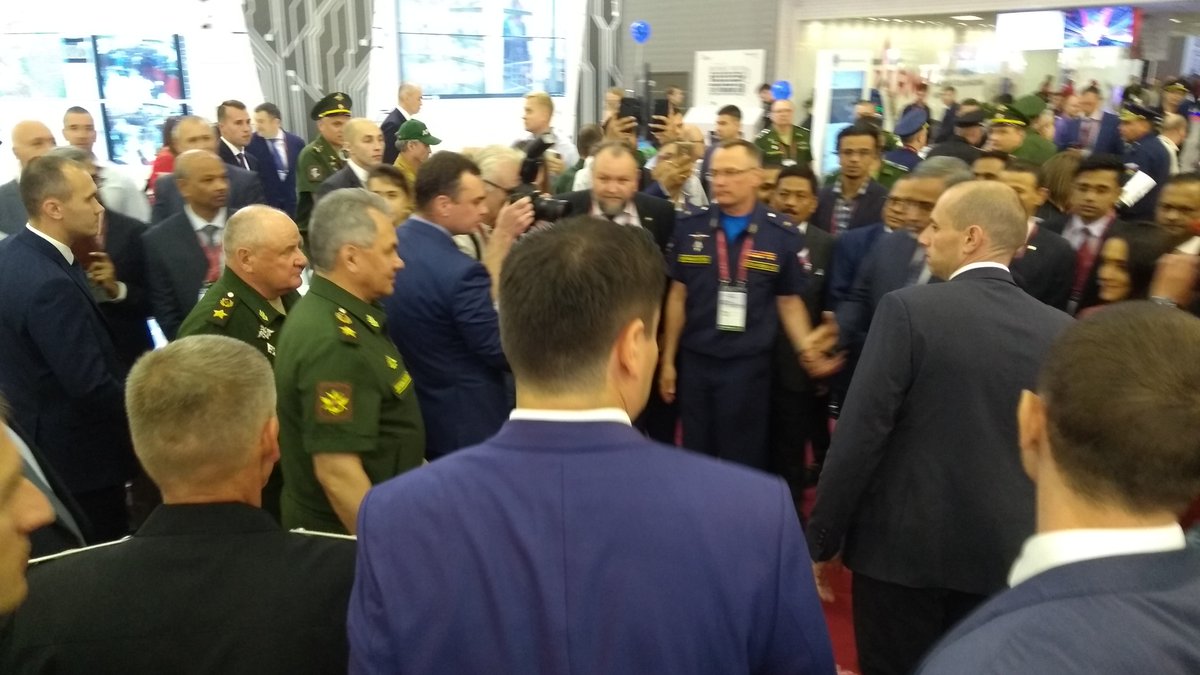 IndiaARMY20191's tweet photo. Hon'ble Defence Minister of Russian Federation, General of the Army Sergey Kuzhugetovich Shoygu, received at India Pavilion by HE The Ambassador of India at Moscow. Earlier in the day, exhibition was inaugurated by Hon'ble Minister https://t.co/4wuAmZiuKj
