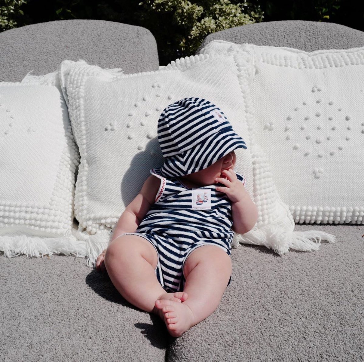 KissyKissyBrand's tweet photo. Soaking up the sun☀️ We love this sunbathing cutie in his Summer Sails Playsuit and Sunhat! Thanks @alexakdell for sharing your #kissykissybaby 💙 https://t.co/iHRFzqG3Pt