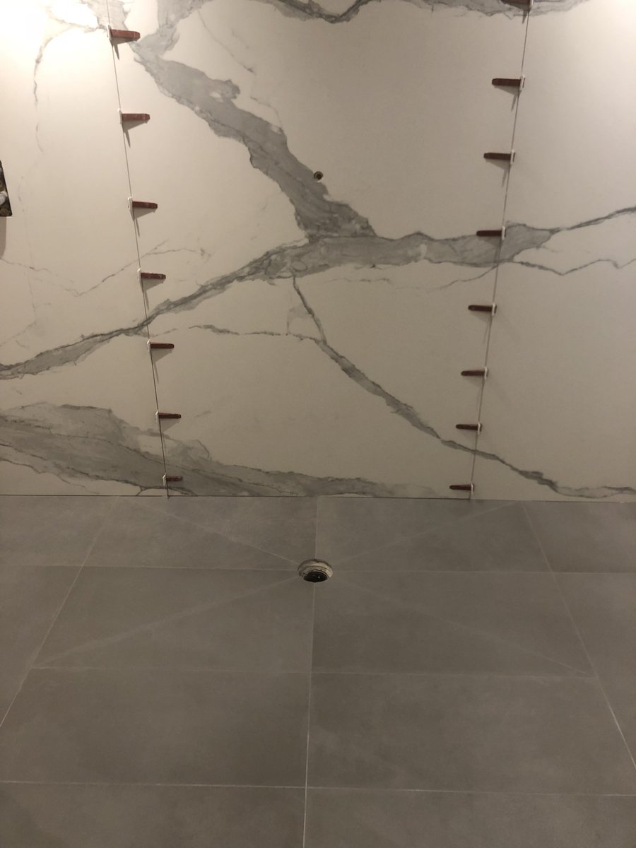 sage_sastiling's tweet photo. 800x800 floor tiles,Large format 2400x1200 on the wall, clips from @perfectlevelmasteruk keeping it perfect. Unfortunately never got a great picture of the finished article. @instarmac.group adhesives #ultratilefix #tiles #largeformat #design #interiordesign #porcelain #bathroom https://t.co/qUSQghTAtY