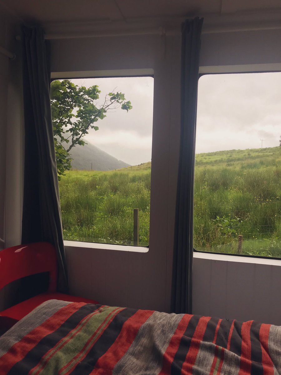 amandacanning's tweet photo. Back in London but wishing I was still in the Trossachs, staying in the @canopyandstars Ferry Waiting Room, falling asleep to the sound of tawny owls and waking up to these views. #alifemorewild https://t.co/zRI5VhdsgM