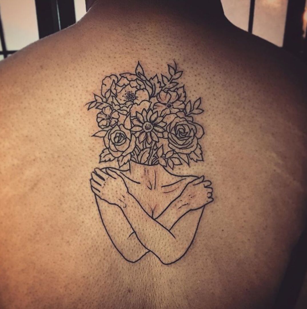 Woman Flower Head Tattoo by megevanstattoo  Tattoogridnet