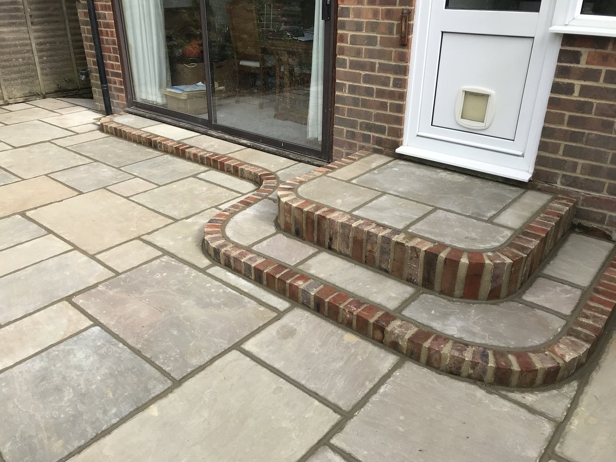 BuckinghamsLand's tweet image. One of our recent projects ticked off and ready for some good weather. Buff Indian sandstone patio edged in godstone bricks and curved steps #hardlandscaping #hardlandscapingdesign #patio #indiansandstone #brickwork #steps #gardendesignsideas