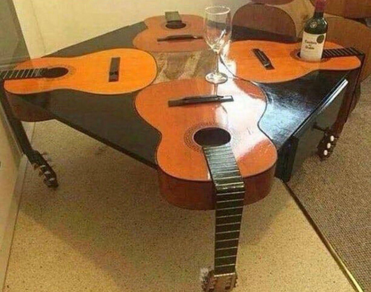 playinglesshurt's tweet image. Not that I’m a wino but this table would entice me to drink! 😉 #music #guitars #winelover