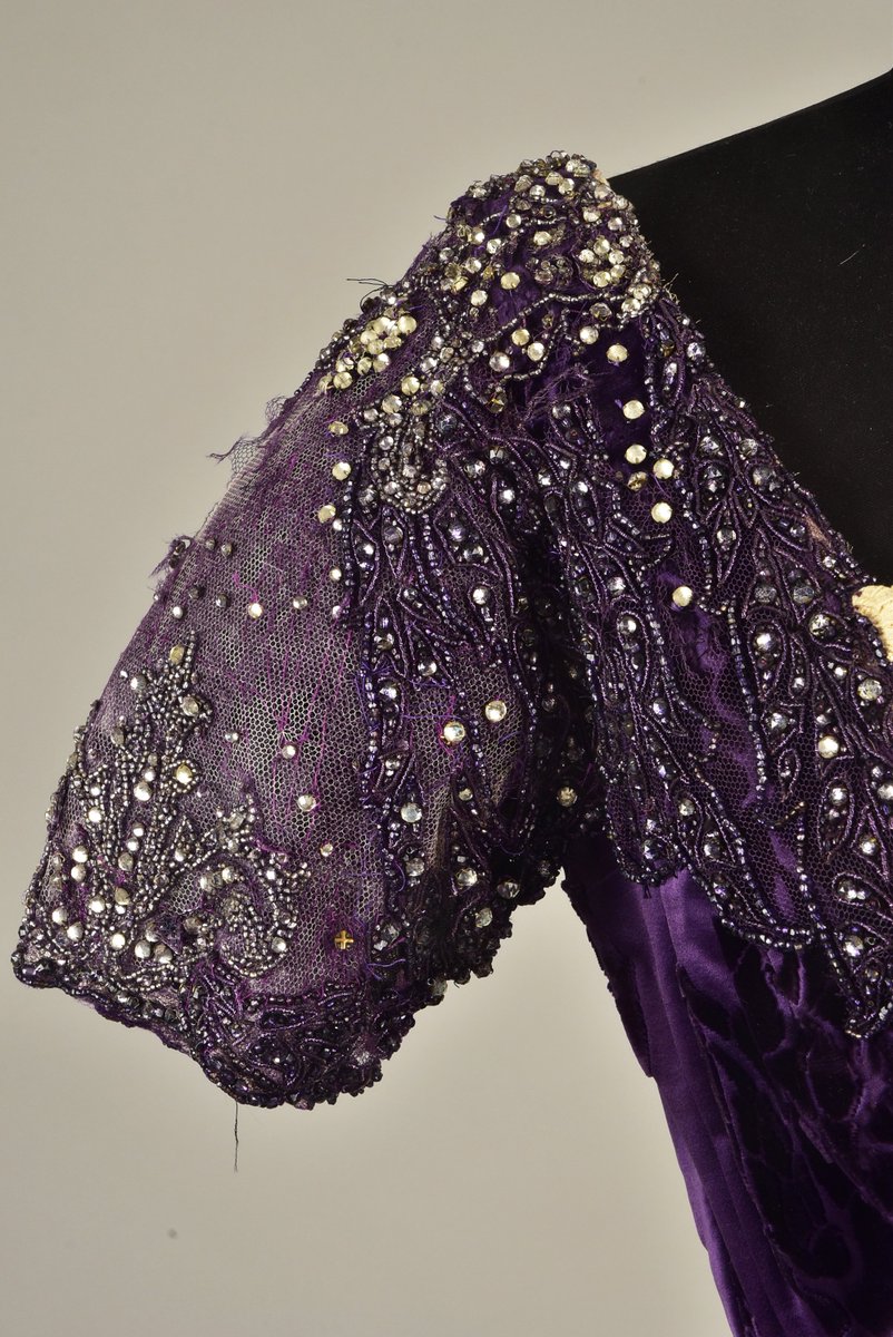 LaurenCDeutsch's tweet photo. Today's #ootd is a 1910 purple Worth satin gown with velvet paisley design. This dress has a very interesting history- it was worn by Cornelia Sherman Martin, the daughter to a close friend of Abraham Lincoln, and the hostess of the famous Bradley Martin Ball. #FashionHistory https://t.co/r3qzwLhWj3
