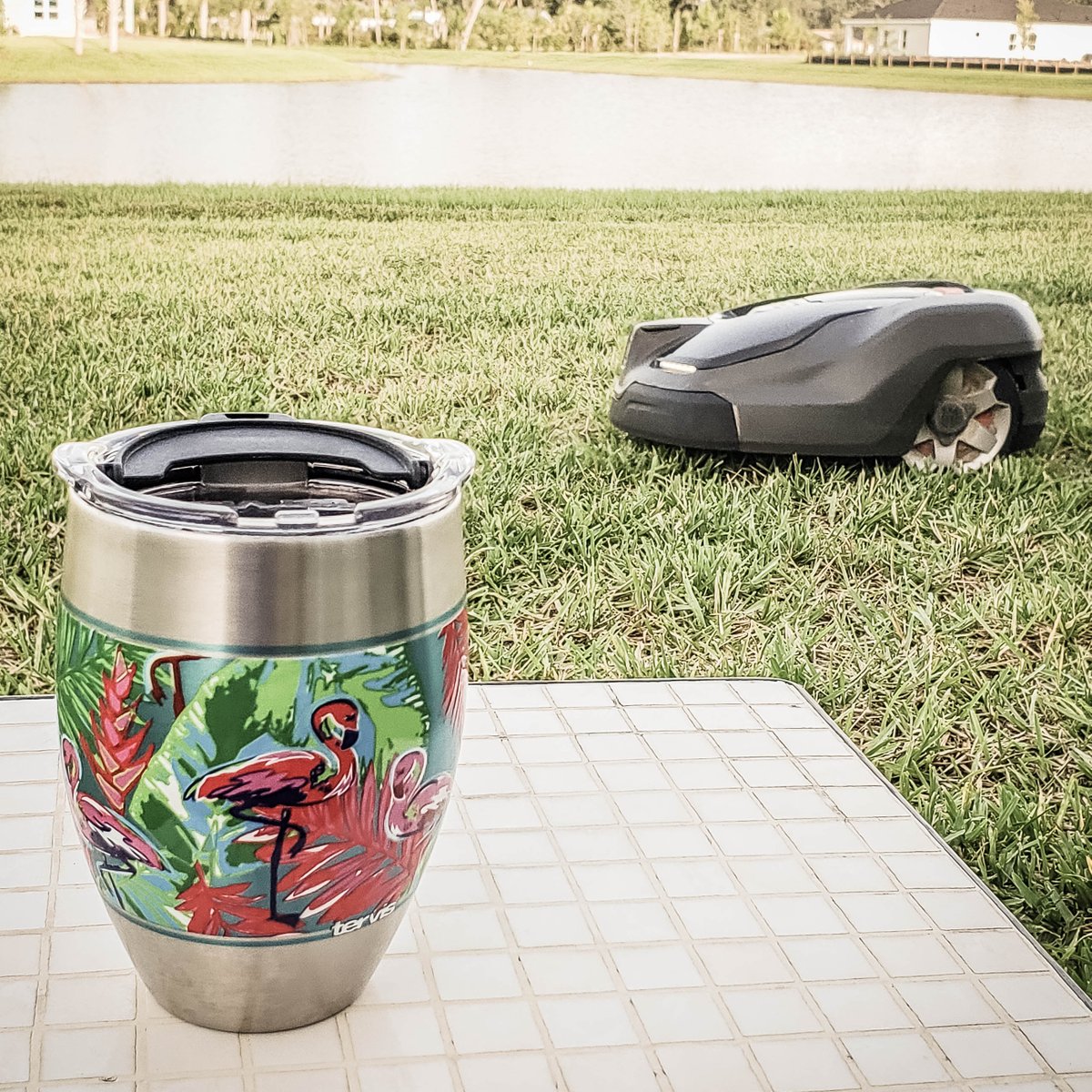 FunMoneyMom's tweet photo. #ad Just sitting here enjoying  a drink while our new @HusqvarnaUSA #automower does all the work! Now instead of worrying about yardwork when he gets home from work, my hubby can sit and have a drink with me. It's a win/win for both of us!  #AutomowerFirst https://t.co/kBDjj7xZ0Z