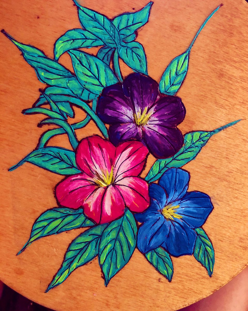 One of the coolest endeavors as an artist is collaborating with my dad’s older brother, here I painted the flowers that he carved. #unclejerry #familycollaboration #woodcarving #woodpainting #acrylic #cherishedart