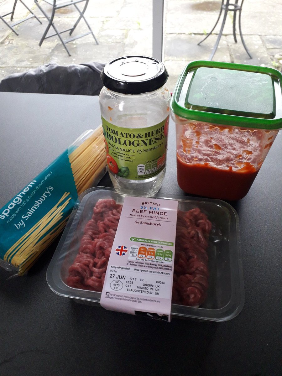 louisewain72's tweet photo. Bad parent? Daughter's cooking at school today, self-chosen meal. Insists she wants to make spaghetti bolognese the way I make it. Poured the sauce into a tub so we don't give the game away π€«#notmasterchef https://t.co/pvGM9vEWp0