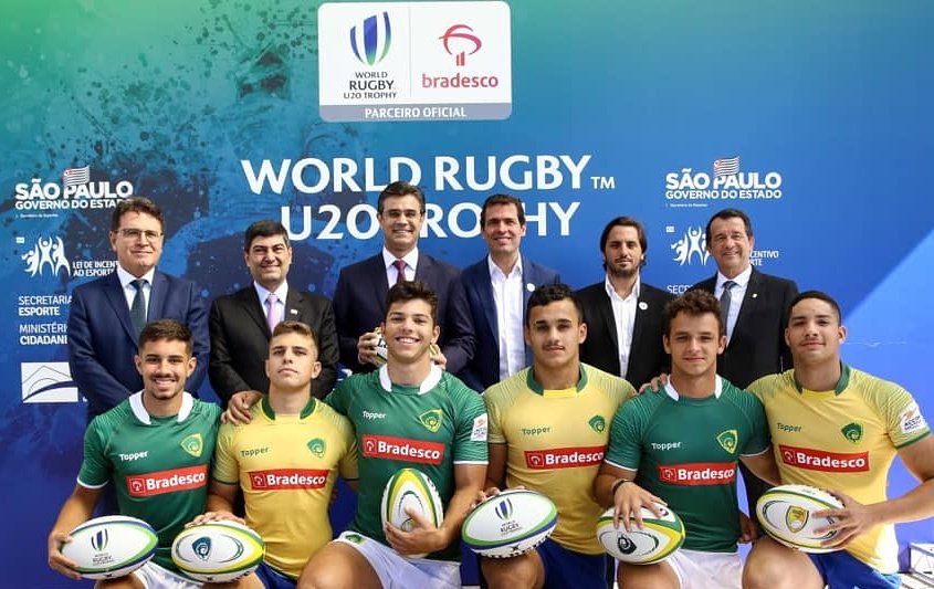 brasilrugby's tweet photo. O lançamento oficial do World Rugby U20 Trophy ocorreu hoje na sede do Governo do Estado de SP com a presença de autoridades como o vice-governador Rodrigo Garcia, o vice-presidente da @WorldRugby Agustin Pichot e o presidente da CBRu @edumufarej #vemprorugby #vemprotrophy https://t.co/5lf6fDmpjr