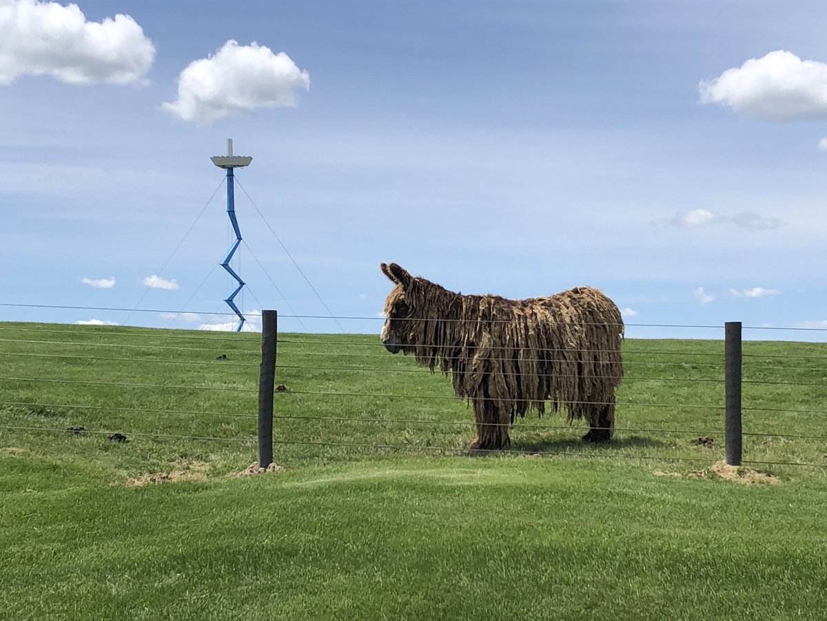 I’ll leave you with this fluffy guy in front of the Domino’s Cellular Tower (1987) [END]