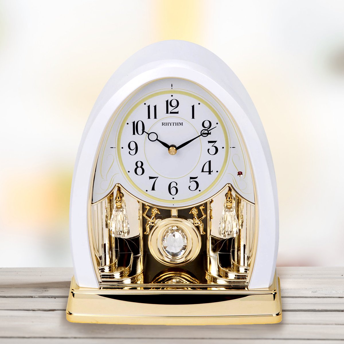 widdopandco's tweet photo. We have some beautiful clocks in our Rhythm range, like this intricate mantel clock with faux marble casing and gold and Swarovski® crystal accents. Plays 12 melodies with 6 Hymns and 6 Christmas tunes. Comes with night sensor feature. #rhythmclocks #rhythm #swarovski #clock https://t.co/YwxTPlOogZ