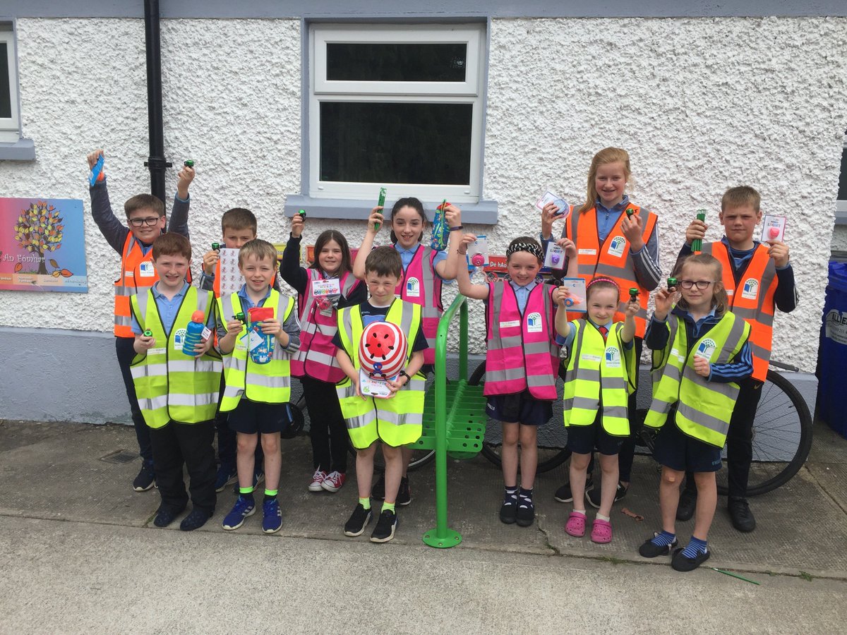 Students from St Fiach’s NS in Ballinacree show off their <a href="/microscooters/">Micro Scooters UK</a> goodies awarded for their #scootoschool Week participation and their brand new fully-funded #greenschools scooter parking!