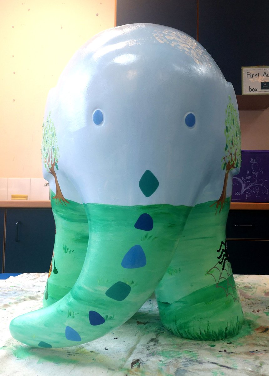 I have finally managed to finish Holystone Primary's very own Elmer, called Pebble 🐘
The whole thing was designed by the children including the school's own characters. The children helped me too with the background colours and fingerprints for the clouds and trees :-)