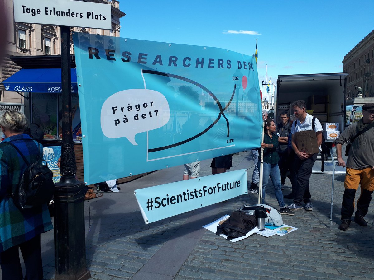 dvdmckay's tweet photo. The #ResearchersDesk was back at #FridaysForFuture in Stockholm today, with climate scientists taking questions from the public and giving #StreetTalks too (including @MartinHedberg and his big scroll of climate science!). #ScientistsForFuture https://t.co/PCaIEDvHsF