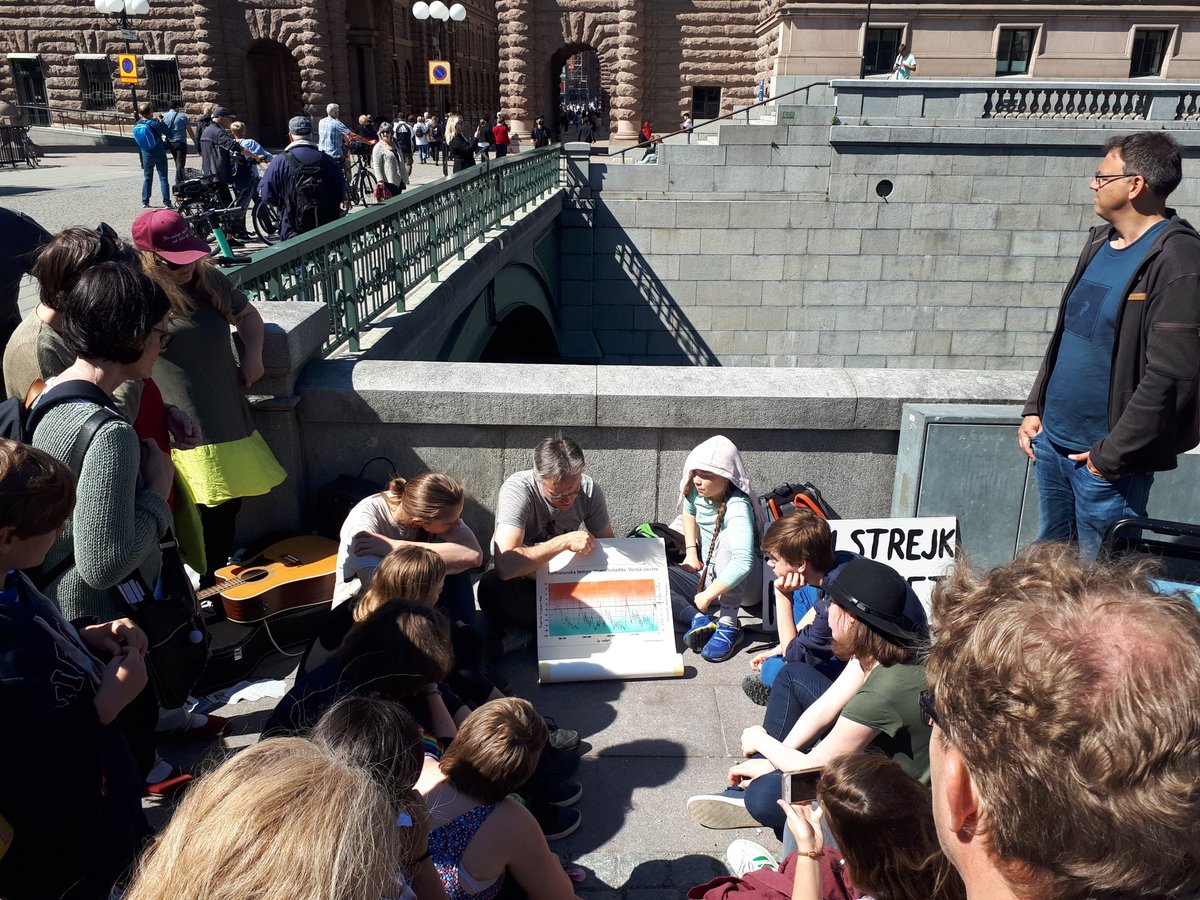 dvdmckay's tweet photo. The #ResearchersDesk was back at #FridaysForFuture in Stockholm today, with climate scientists taking questions from the public and giving #StreetTalks too (including @MartinHedberg and his big scroll of climate science!). #ScientistsForFuture https://t.co/PCaIEDvHsF